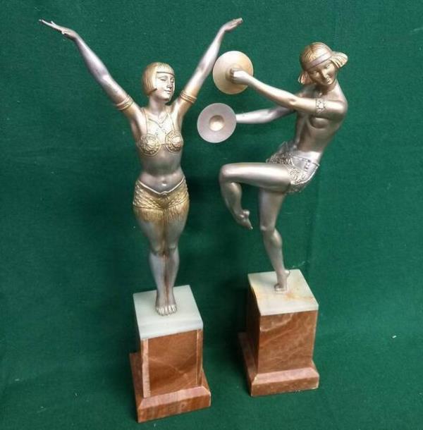 A pair of art nouveau figures on marble bases at Marshs. A pair of art nouveau figures on marble bases at Marshs.