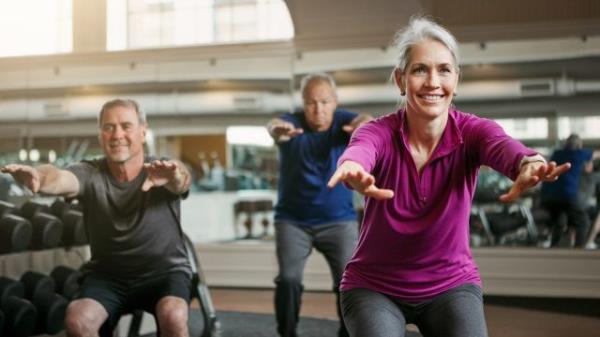 Shot of a senior group of woman and men working out together at the gym