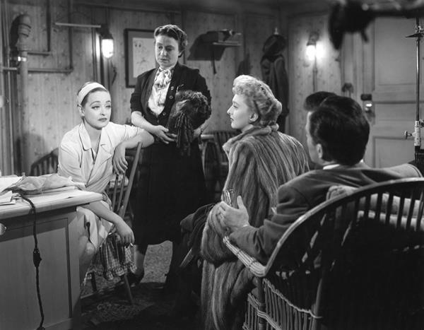 Bette Davis and cast in dressing room on the set of All about Eve