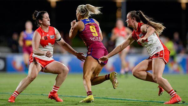 Paris McCarthy chases down Tipperary native Orla O'Dwyer of the Brisbane Lions in action during the 2023 AFLW Round 03 match between the Brisbane Lions and the Sydney Swans at Brighton Homes Arena on September 17, 2023 in Ipswich, Australia. Pic: Russell Freeman/AFL Photos via Getty Images