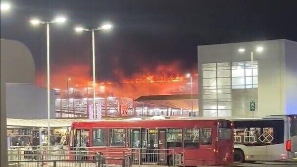 Luton Airport closed as fire rips through car park