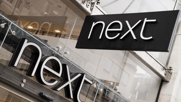 Next sales rise as shoppers move online during 'changing weather conditions'