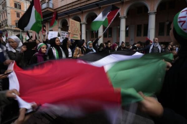 Demo<em></em>nstrators wave a Palestinian flag during a rally in support of the Palestinian population in Gaza, in Rome, Saturday, Nov. 4, 2023. (AP Photo/Alessandra Tarantino)
