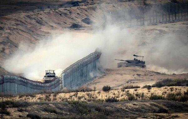 Israeli tanks at the border fence amid ongoing battles. Picture: FADEL SENNA/AFP via Getty Images Israeli tanks at the border fence amid ongoing battles. Picture: FADEL SENNA/AFP via Getty Images