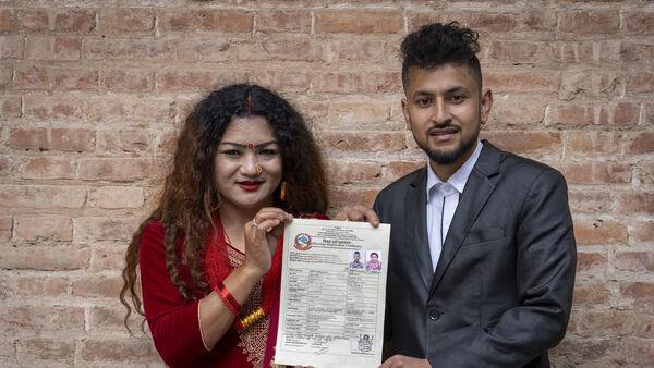 Nepalese couple vow to co<em></em>ntinue campaigning after same-sex marriage recognised