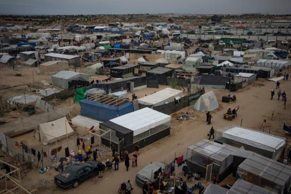 Six Palestinians killed in Israeli military raid on refugee camp, officials say