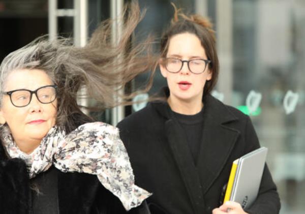 Martina Burke and her daughter Ammi Burke apparently believed that the court had ordered the parties involved in the application only to attend via video-link. Photo: Collins Courts Martina Burke and her daughter Ammi Burke apparently believed that the court had ordered the parties involved in the application only to attend via video-link. Photo: Collins Courts
