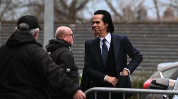 Nick Cave arrives at the funeral of Shane MacGowan. Picture: Larry Cummins