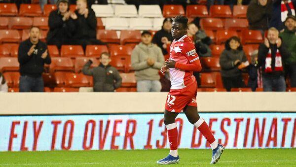 Fabio Jalo celebrates his goal to make it 2-2 during the FA Cup match against Horsham.