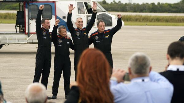 Astronauts head to space station on chartered flight